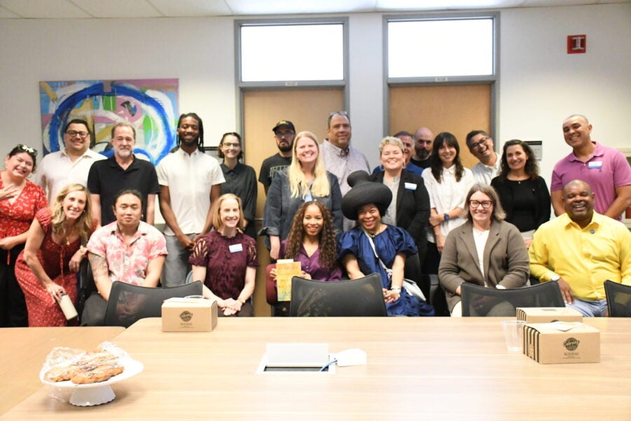 Attendees gathered for a group photograph at the book talk.